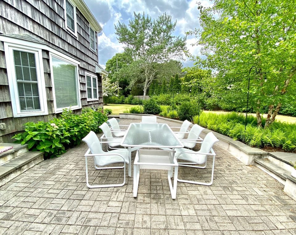 Patio dinin; has large umbrella for sunny afternoons.