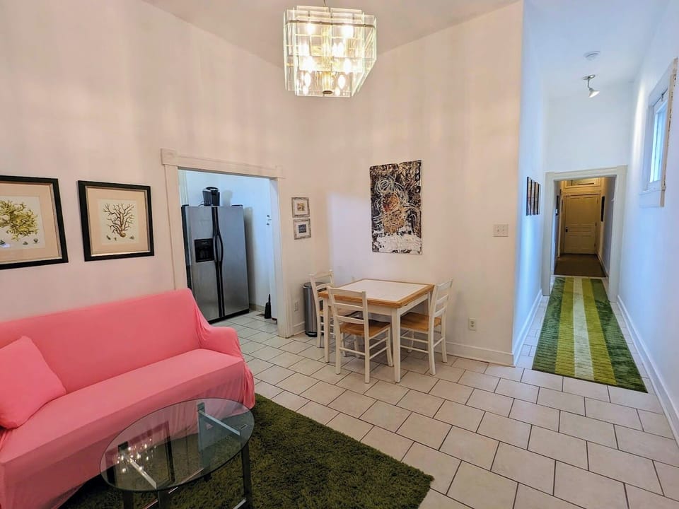 Walk in and the living area & kitchen are on your left, bedrooms are ahead.