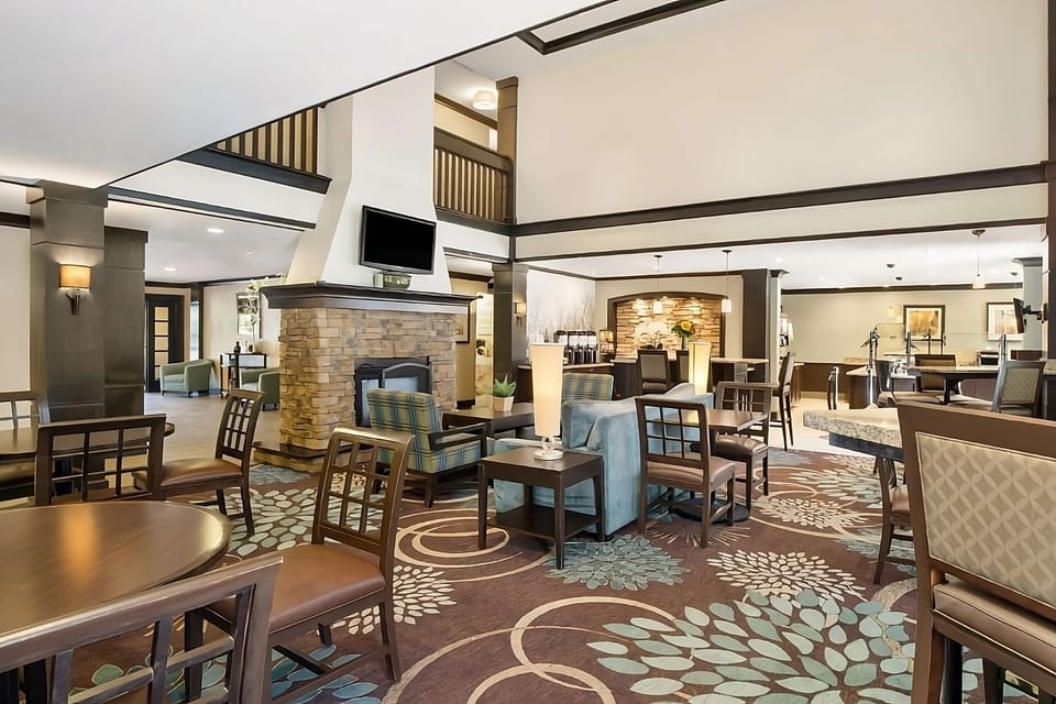 Gather for conversation in the spacious lounge with cozy seating.