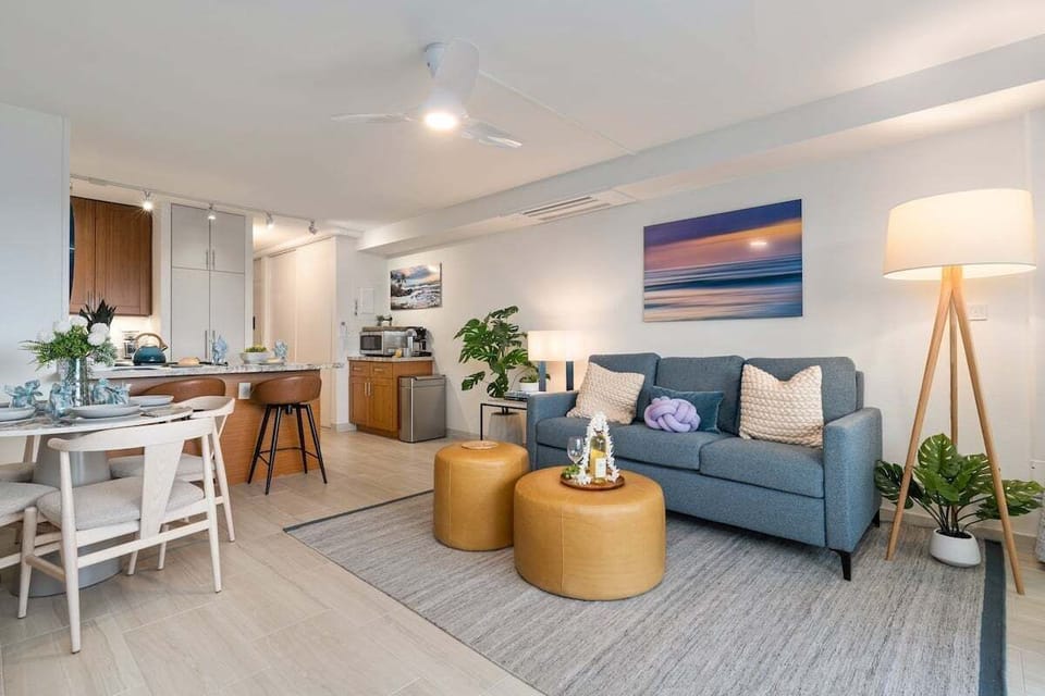 Enjoy a cozy seating area with easy access to the kitchen and dining space for convenience