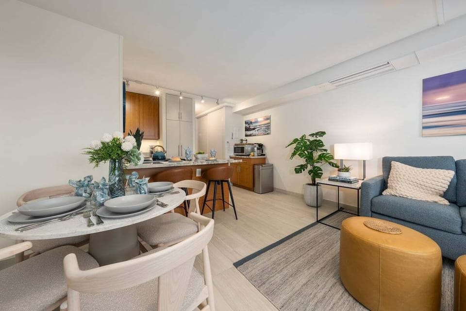 This inviting space offers a comfortable dining setup with easy access to the kitchen and living area