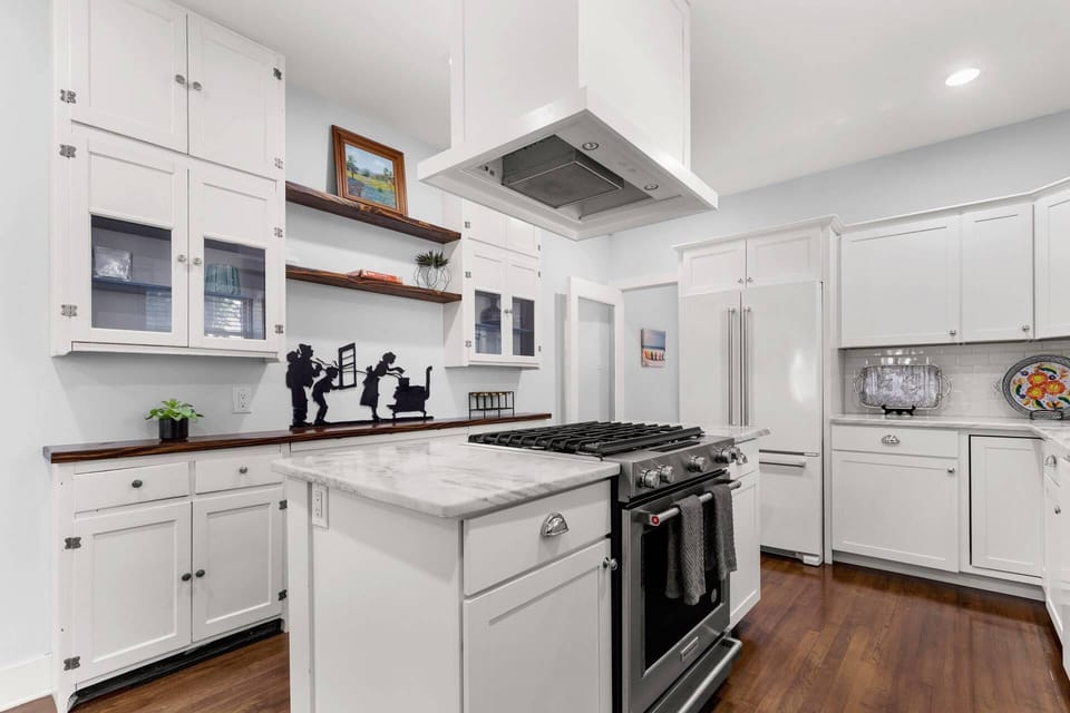 Discover the charm of a vintage touch in the kitchen, showcasing an original built-in storage feature that seamlessly combines functionality and chara