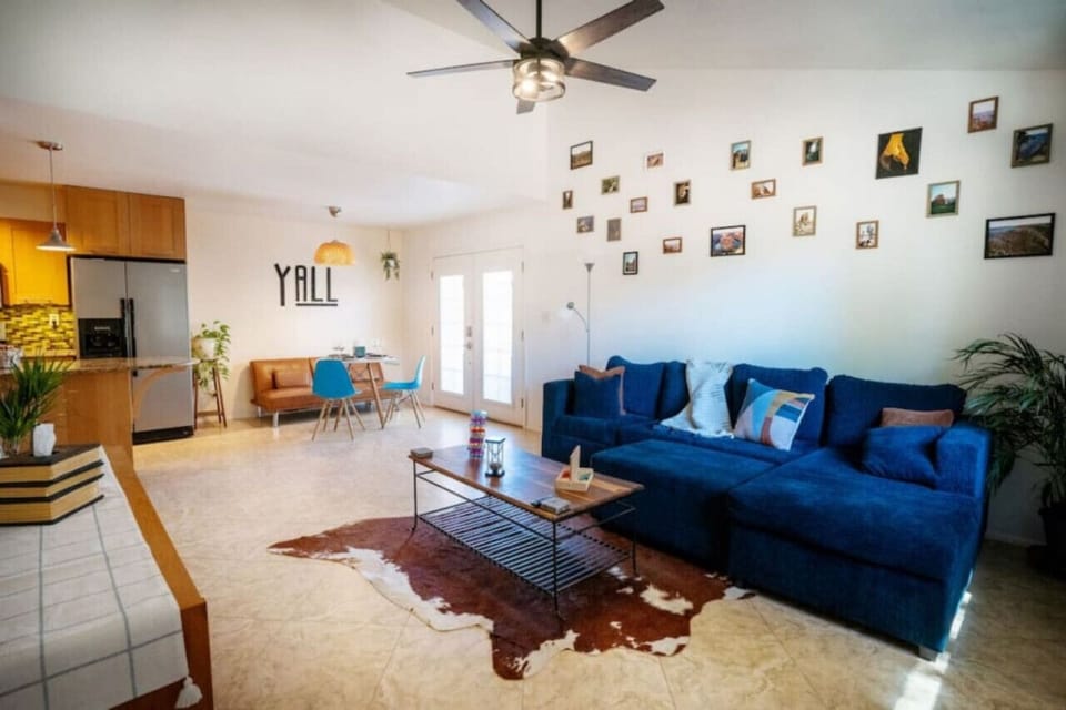 Handmade touches & owner’s photos make this living room warm and inviting.