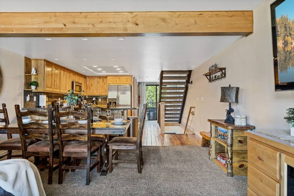The home features a pacious living room that  opens into an open concept kitchen .