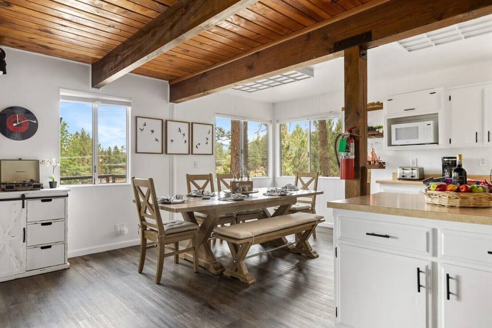 Enjoy a homecooked meal or family board game session at the comfortable dining table that`s open to the kitchen! The dining table sits 8 comfortably.