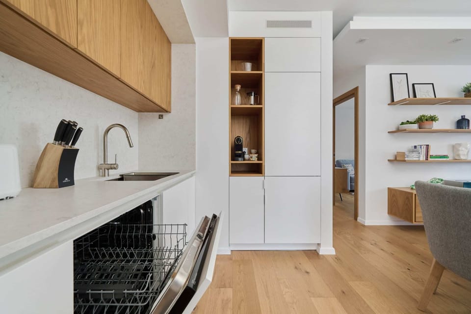 Kitchenette with a dishwasher.