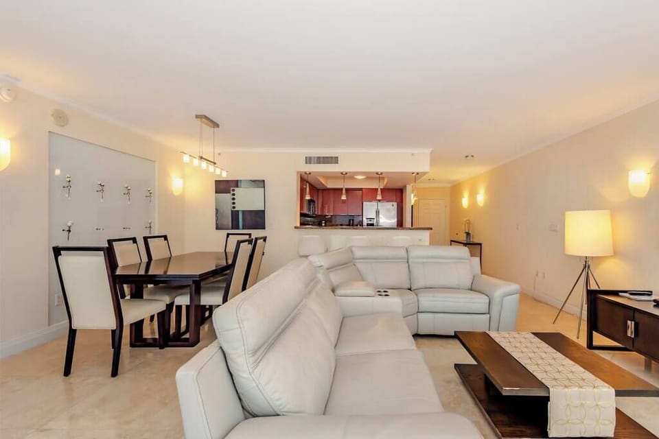 Corner unit with floor to ceiling windows cover the entire living. Amazing ocean views, intracoastal views, and downtown Miami skyline.