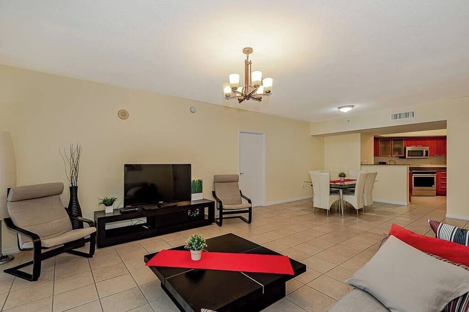Relax in our inviting living room, furnished with modern decor and ample seating for enjoying time together.