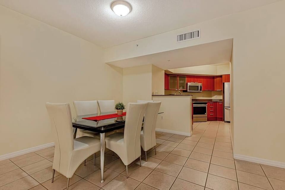 Dining room comfortably seating six guests.