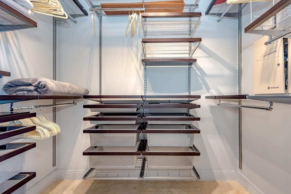 Modern walk-in closet designed for convenient storage and organization of clothing and accessories