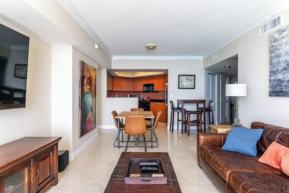Open-concept living room seamlessly integrated with a dining area, perfect for entertaining and family gatherings