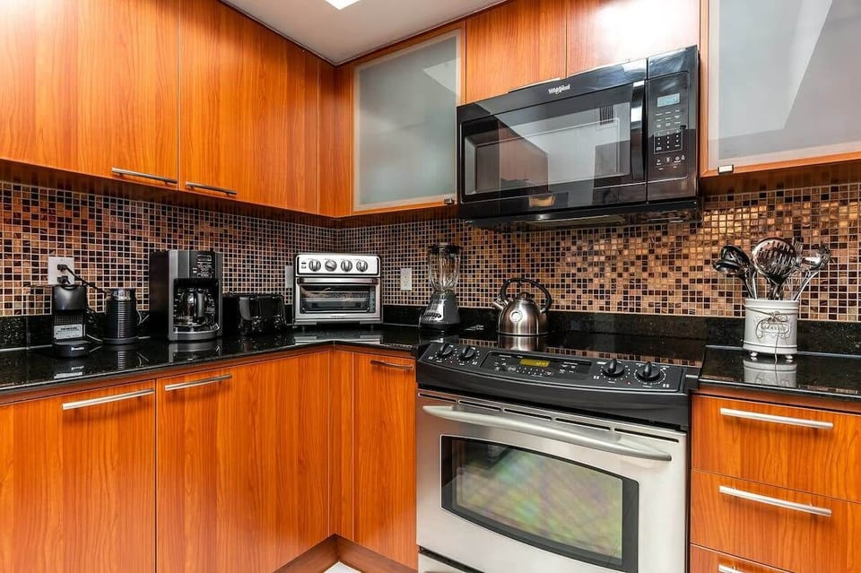 Fully equipped kitchen with state-of-the-art appliances and ample counter space.