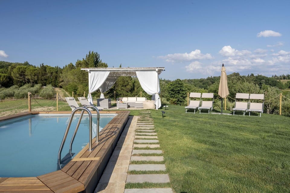 Water, Sky, Plant, Cloud, Property, Shade, Swimming Pool, Tree, Outdoor Furniture, Grass