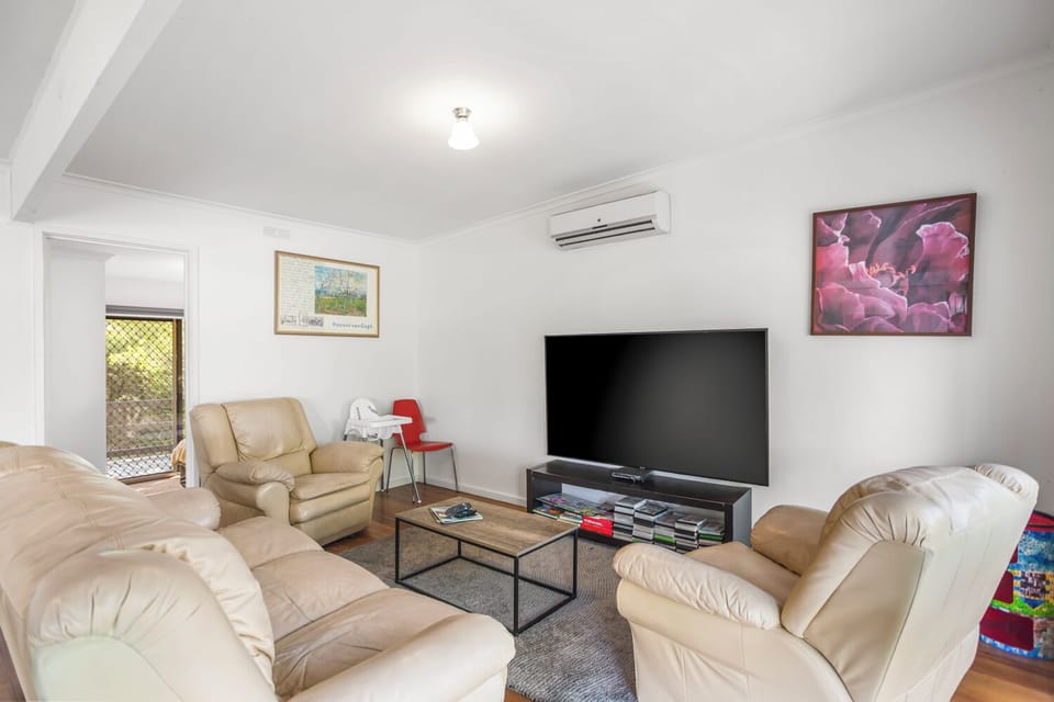 Smart TV and Comfortable sofas for your family to unwind in the living room
