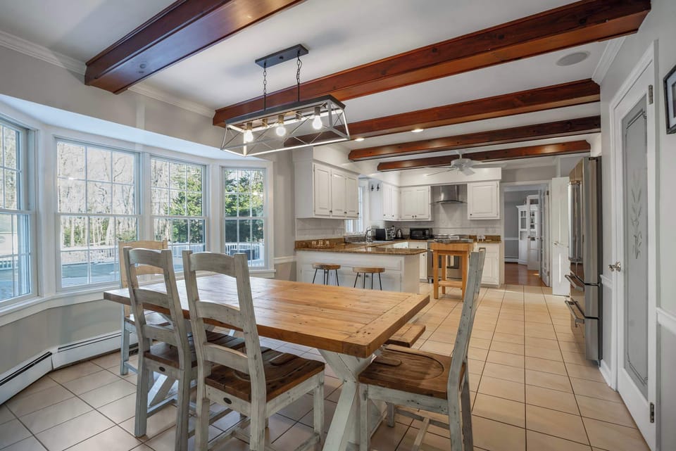 Breakfast nook adjacent to the well-appointed kitchen area