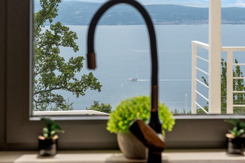 The panoramic sea views from the kitchen area are breathtaking.