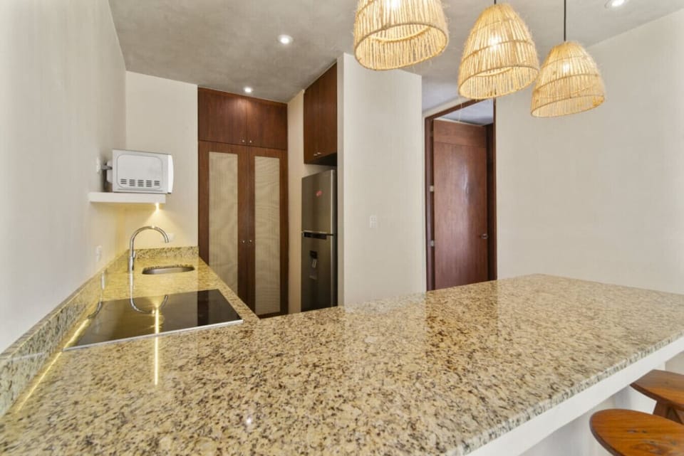 Modern kitchen with top appliances—perfect for your Tulum meals.