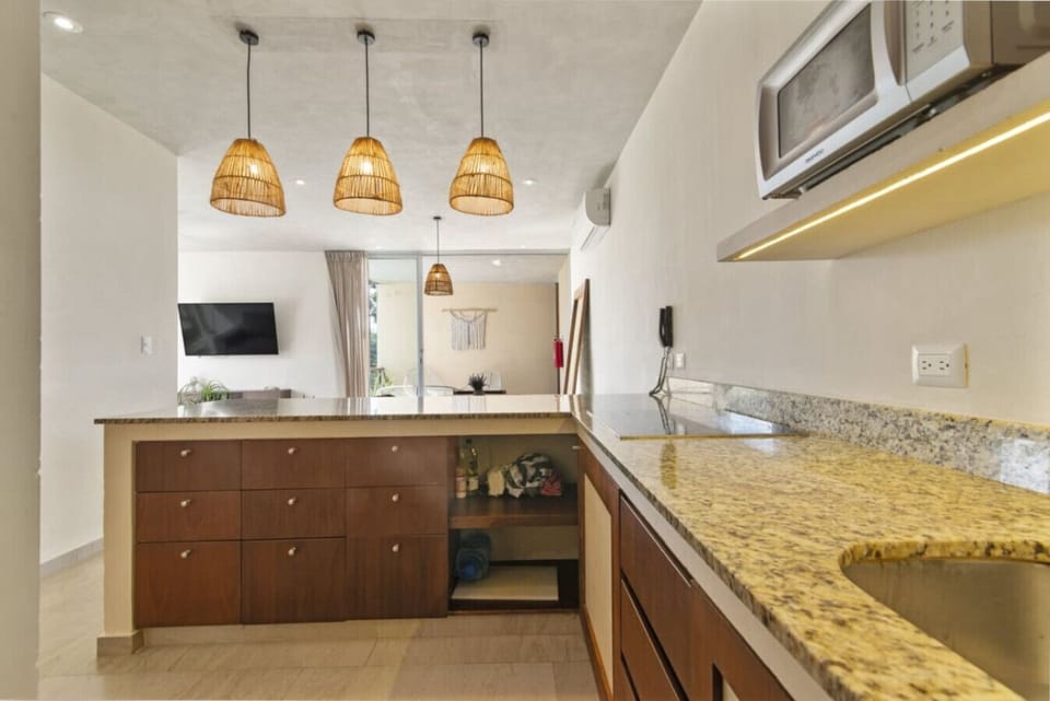 Modern kitchen with top appliances—perfect for your Tulum meals.