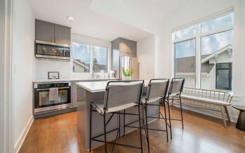 Large island with under counter outlets.