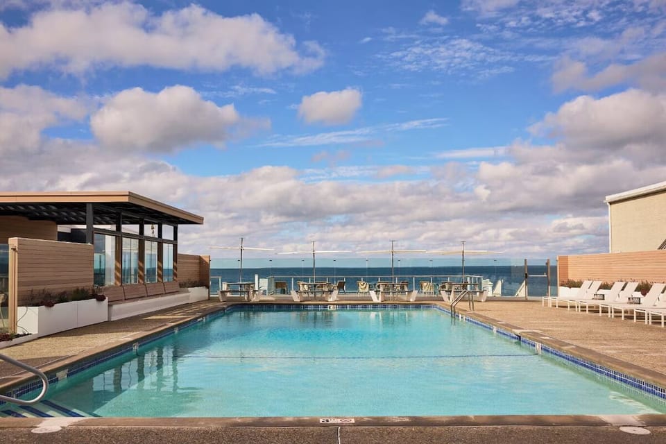 Dive into the sparkling pool with sweeping ocean views.