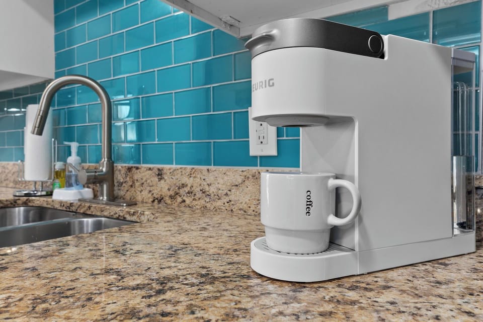 Keurig coffee machine w/ K cups for your convenience 