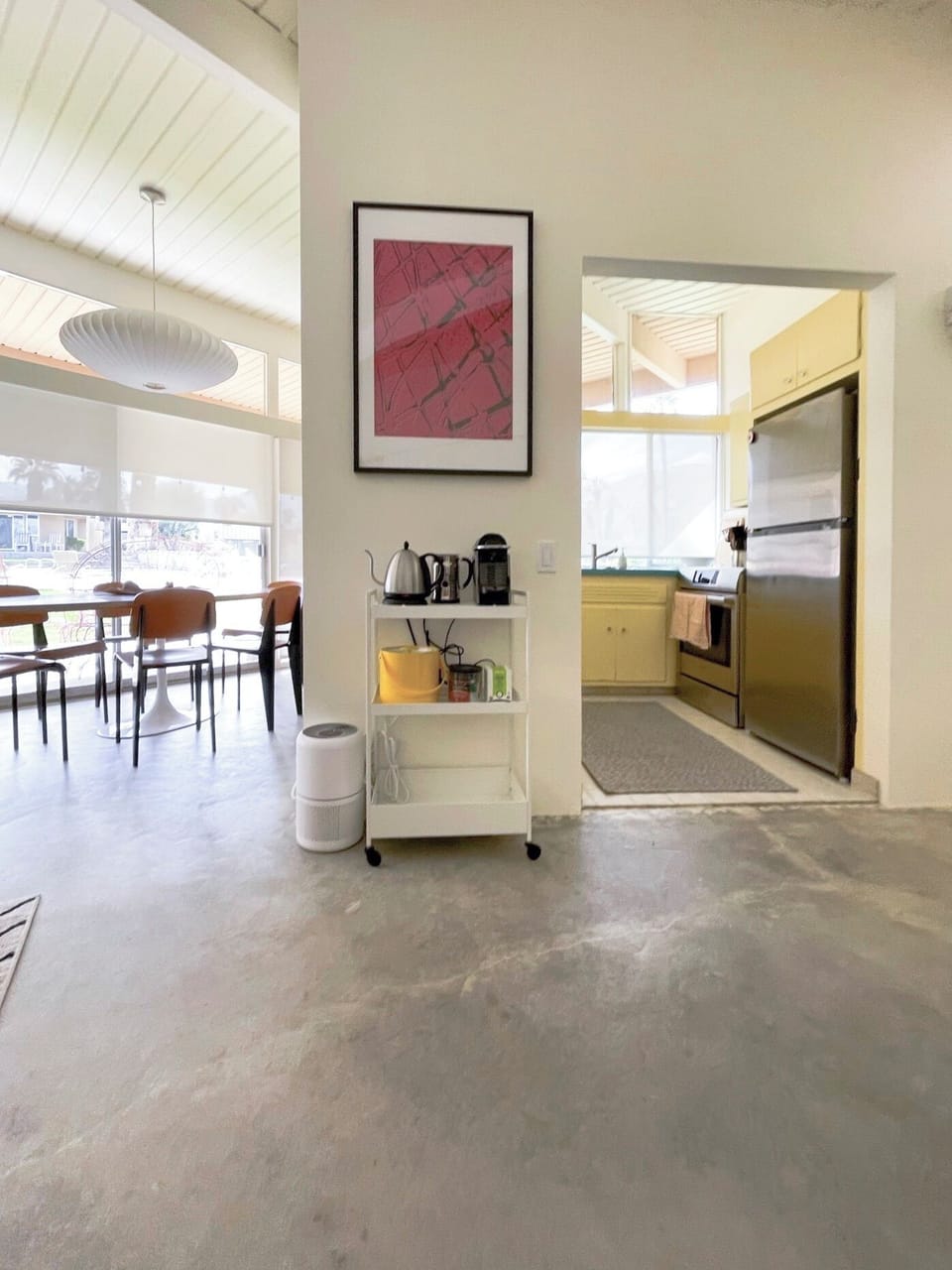 Fully stocked kitchen is open to living/dining room