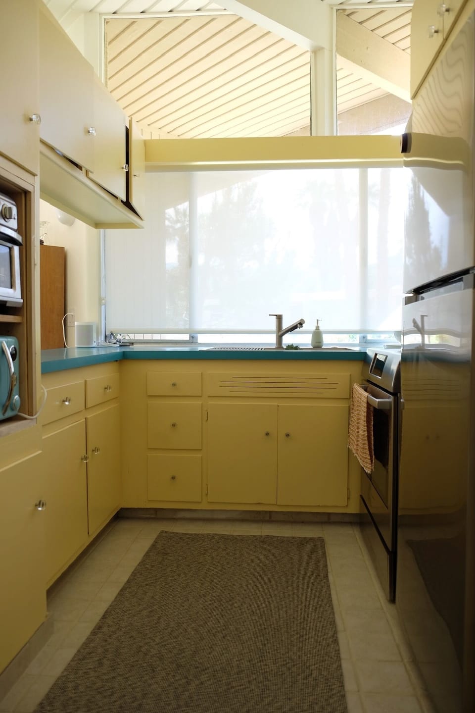 Kitchen has the original details with modern appliances.