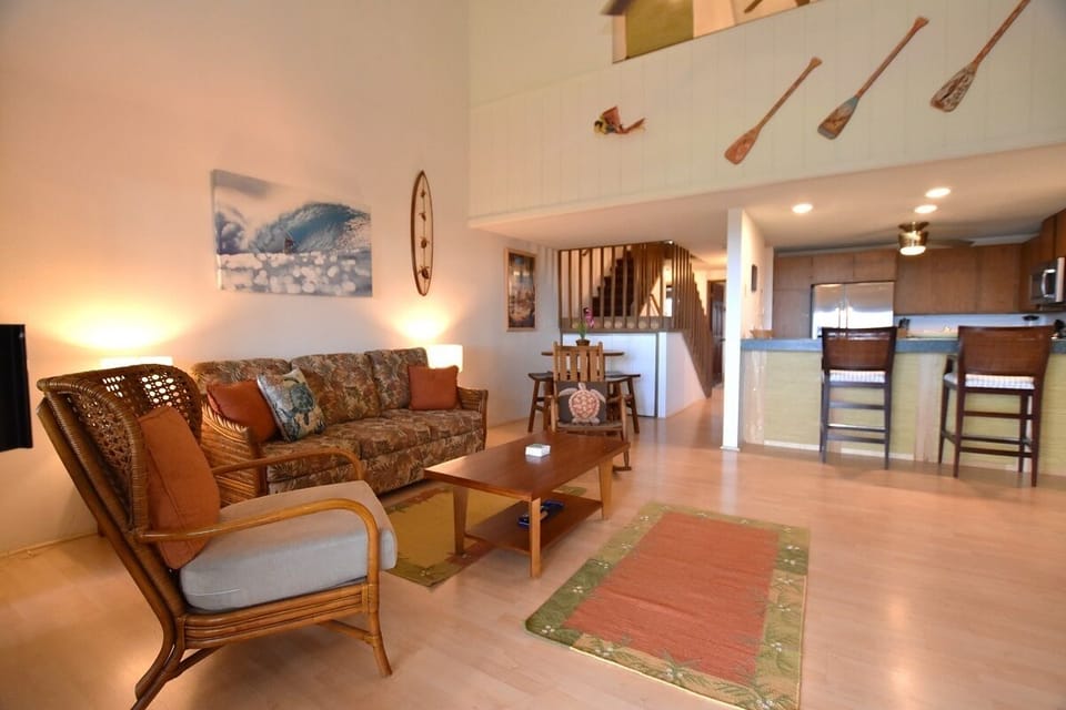 Open floor plan with cathedral ceiling