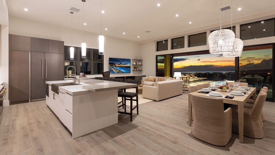 Modern, 12 foot ceilings,  85" TV, 
 large lanai sliders open to lanai with ocean and sunset views