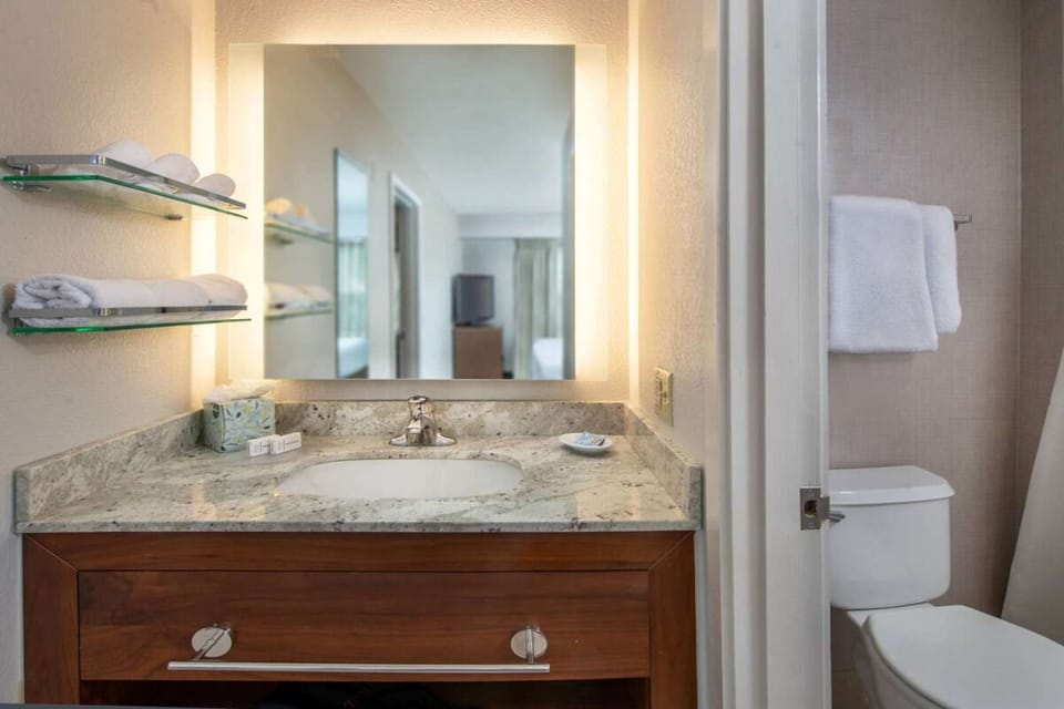 Step up to a sleek vanity and enjoy bright, even lighting.