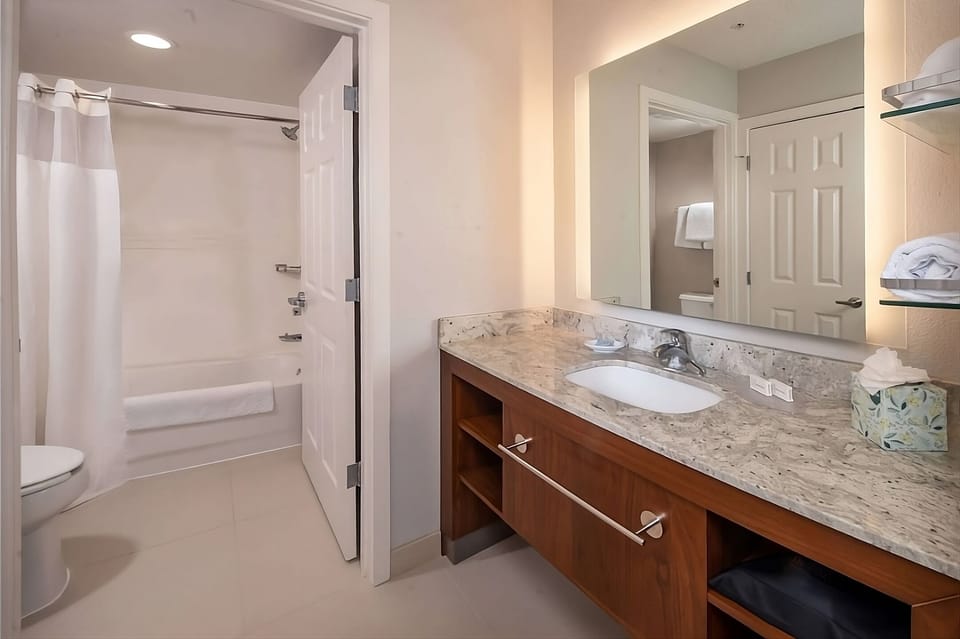 Soak away the day in a clean, simple tub-shower combo.