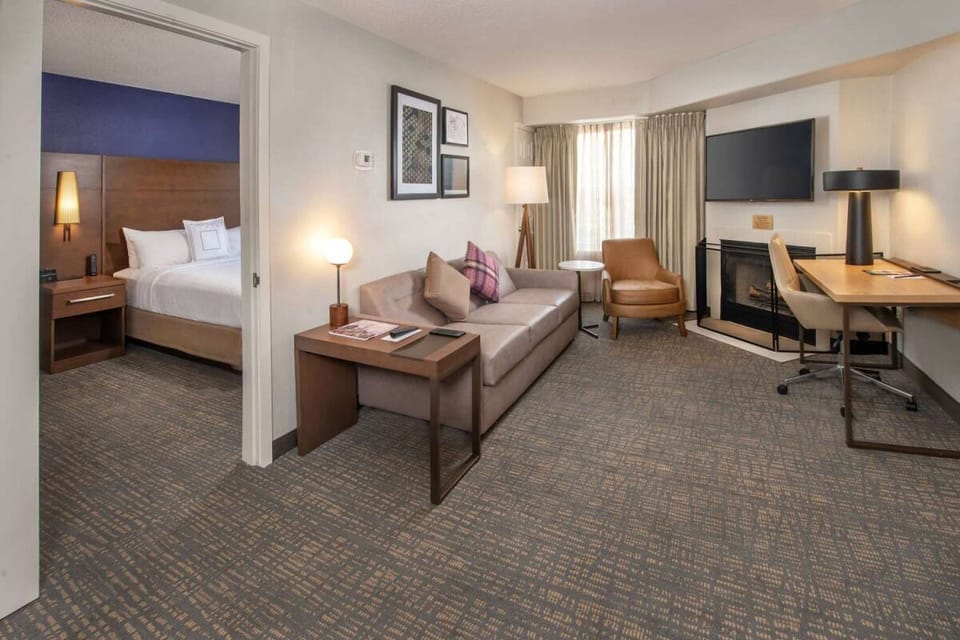Stretch out in your spacious suite with sofa, fireplace, and desk.