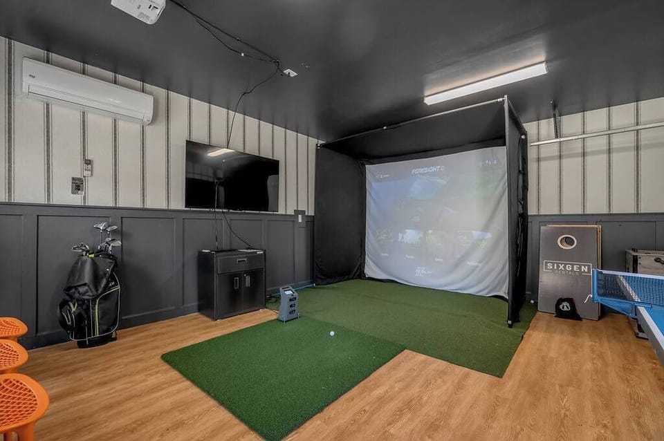 Load
up a course on
the golf
simulator and
let the group
argue about
who's actually
any good —
rainy
afternoons are
secretly the
best
afternoons
here.
