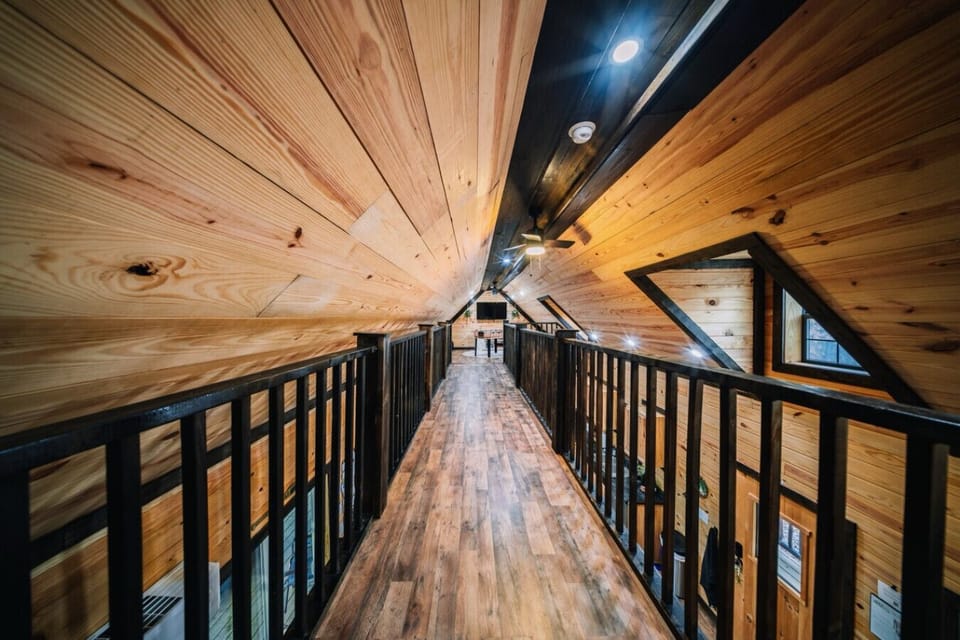 The upper level hallway connecting the bedroom and game room