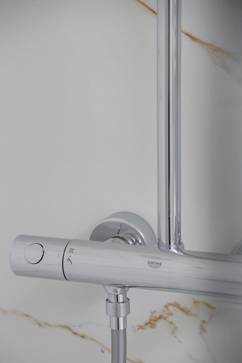Close-up of a modern rain shower, emphasizing comfort and style.


