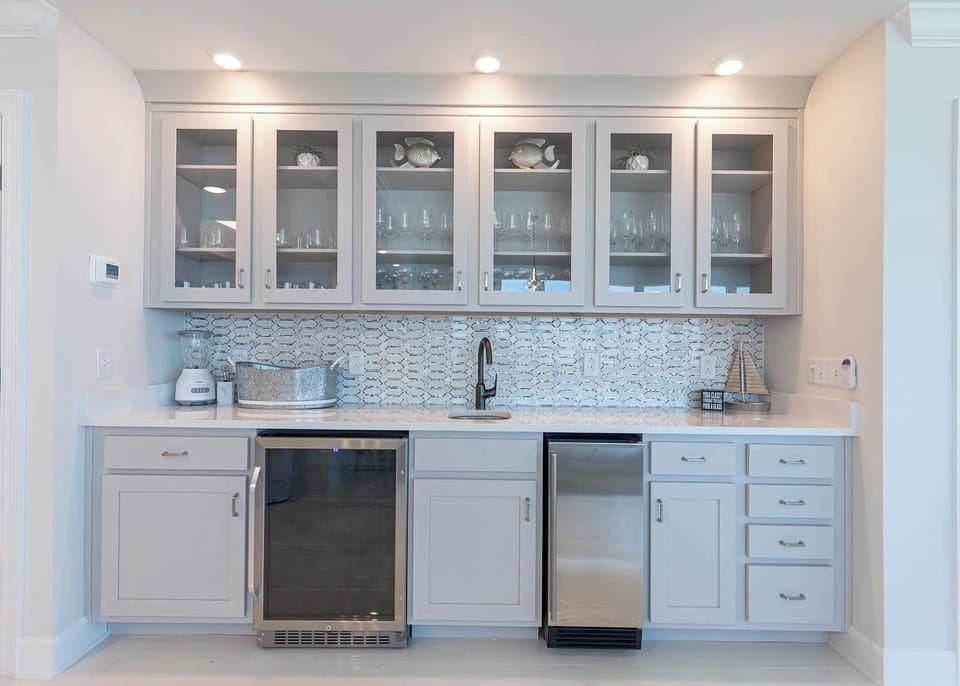 Grab a chilled drink from the fridge or chilled bottle from the wine cooler at the wet bar