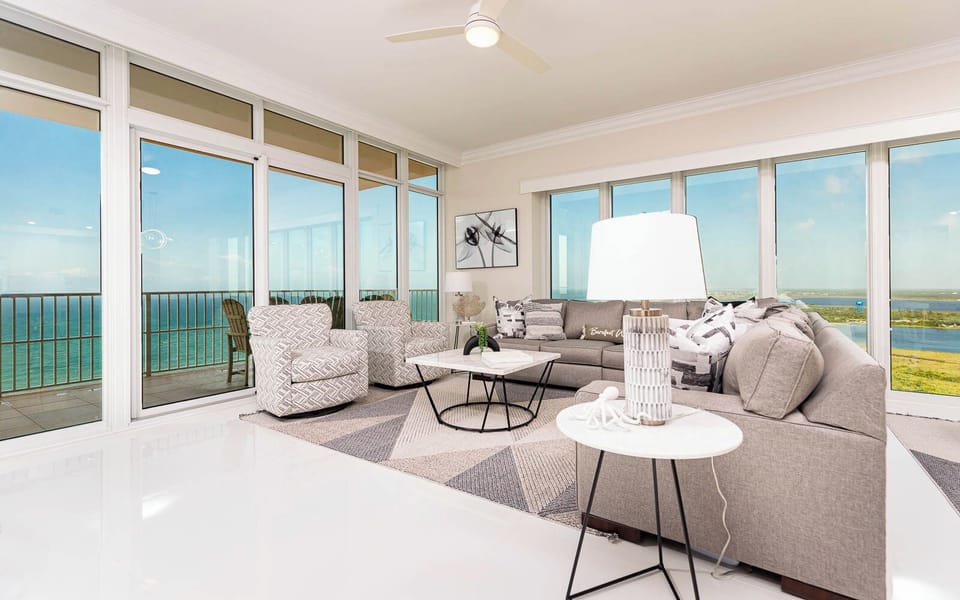 Sink into the sectional and step onto the balcony to hear gulf waves and watch the shore