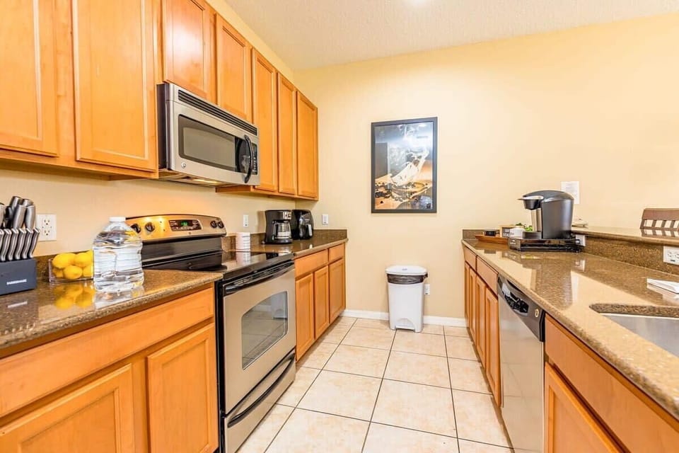 Prepare meals comfortably in the fully equipped kitchen.