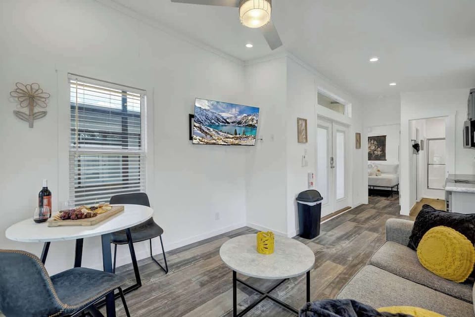 The cozy dining nook nestled in the corner exudes an intimate ambiance