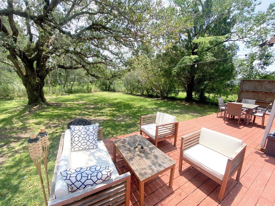 Large, private back deck with plenty of seats for everyone.