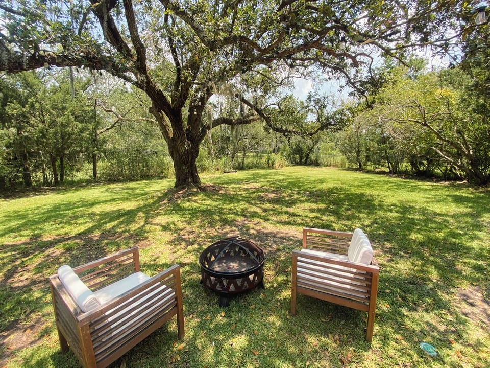 Spacious, fenced in backyard on tidal creek. 