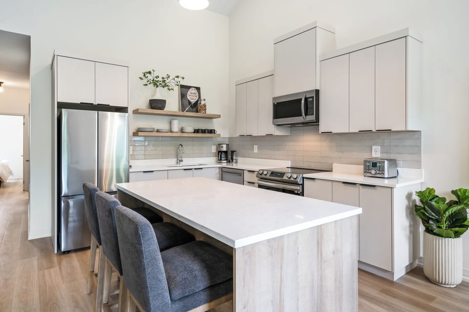Great room with kitchen, living, dining