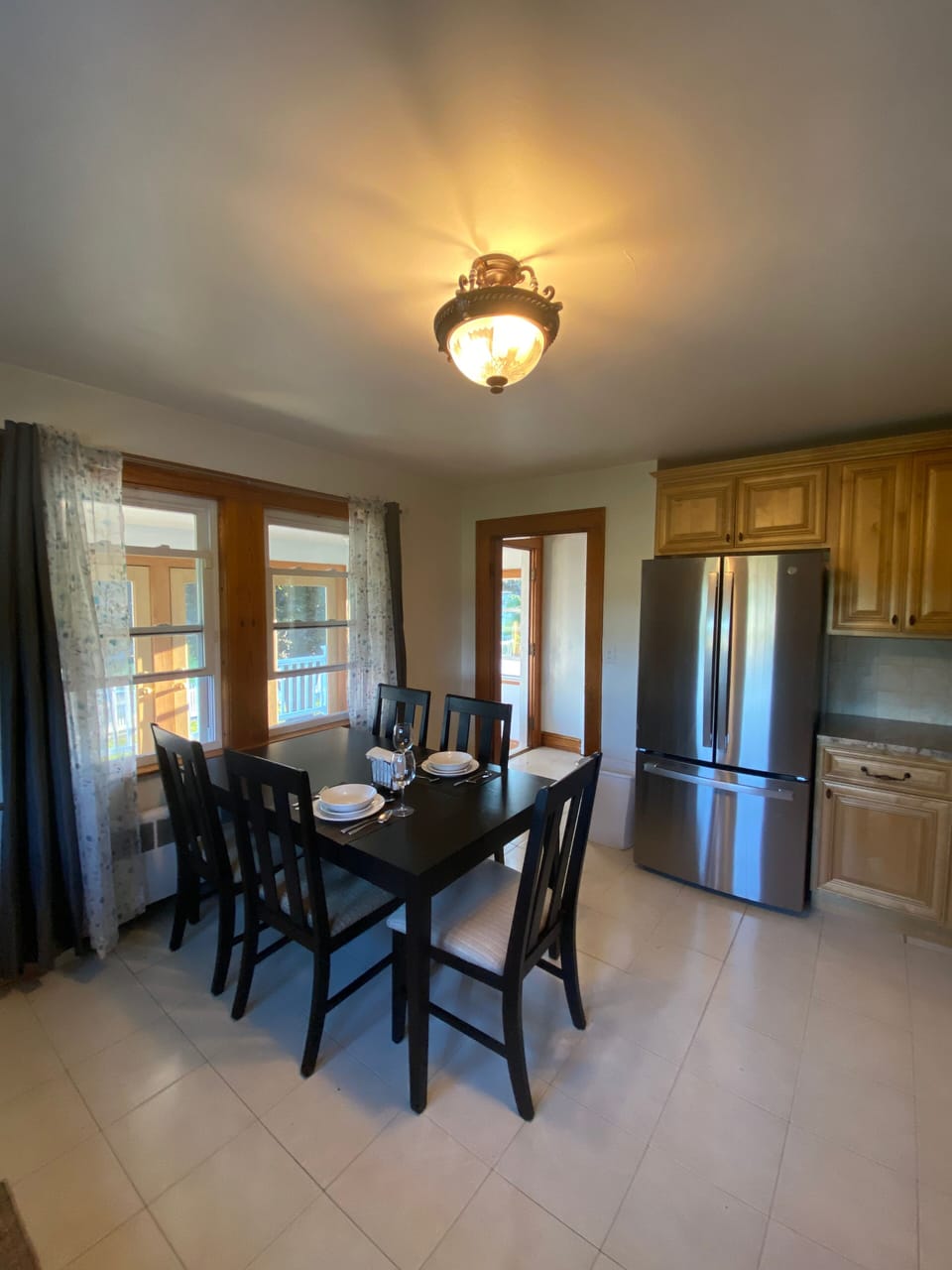 Newly renovated kitchen overlooking sunroom