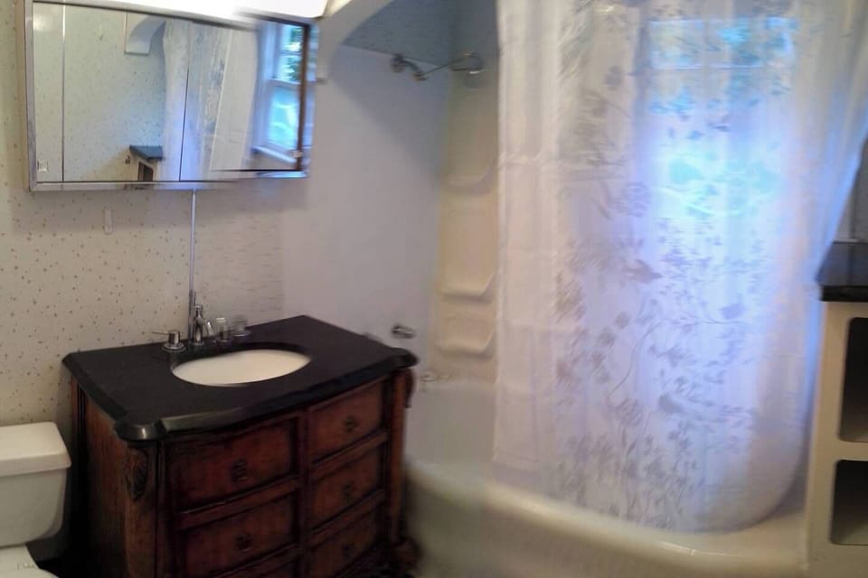 Super Fun Sink Chest with Granite Top in the Bathroom!