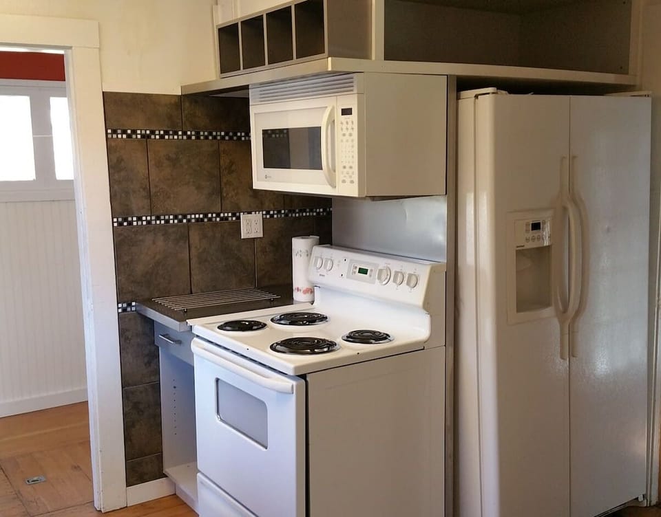 Fully Equipped kitchen includes Cookware & Bakeware + Dishes and Silverware.