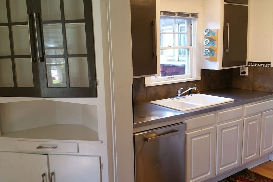 Kitchen has been updated with stainless steel countertops & glass tile inserts in the backsplash! Microwave, wide mouth toaster and coffee machine just brought in for your convenience as well.