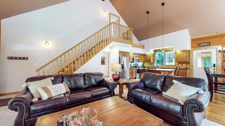 Plenty of seating for all, large coffee table perfect to gather around for a card game or puzzle