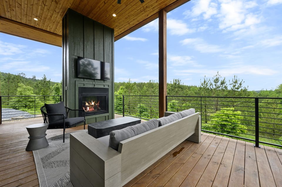 Outdoor Lounge: Unwind by the fire with stunning views and a sleek design—pure relaxation awaits!