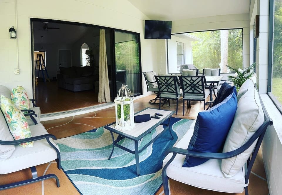 4 season patio to the backyard BBQ, fire pit, swing, climbing gym, and seating.