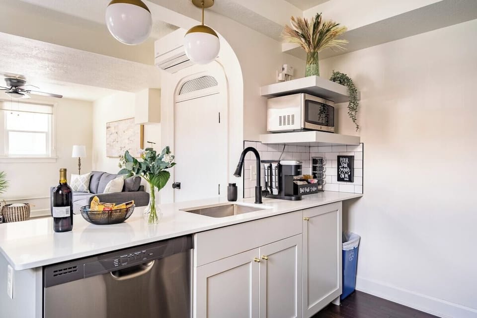 Cleaning up is a breeze with this farmhouse sink and dishwasher!
